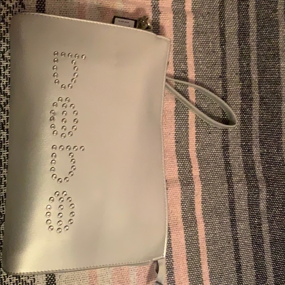 A Bebe clutch bag . Still has the tag. Never used. - Picture 1 of 1